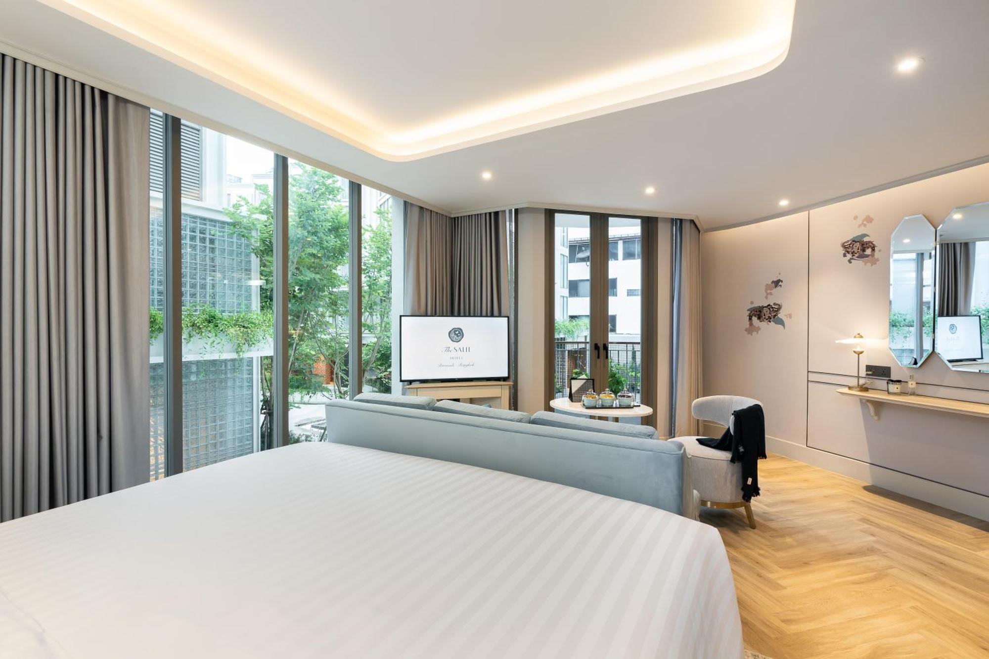 The Salil Hotel Riverside Бангкок Экстерьер фото Deluxe Room